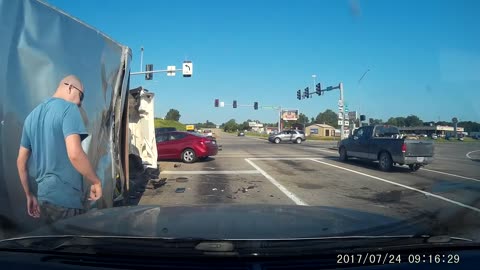 Lowes truck runs red light.