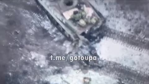 Russian Tank Drags Soldiers