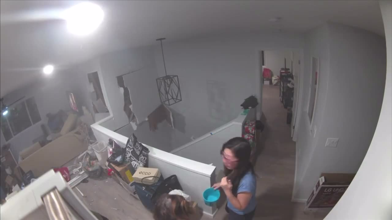 A 5’ x 5’ boulder crashes through a home in Palolo Hawaii . Volume is loud