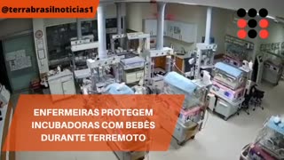 Enfermeiras protegem incubadoras com bebês durante terremoto