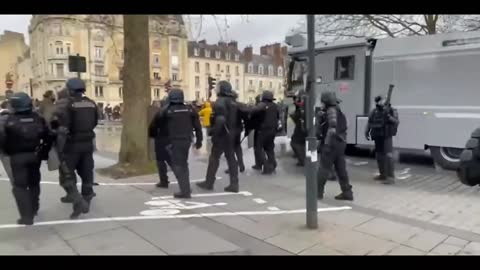 Water cannons and tear gas in France against Participants of Protest against Pension Reform