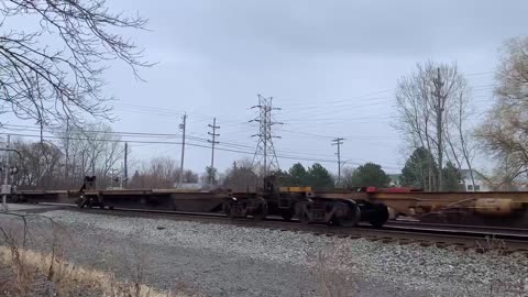 Triple CSX Train engine going fast