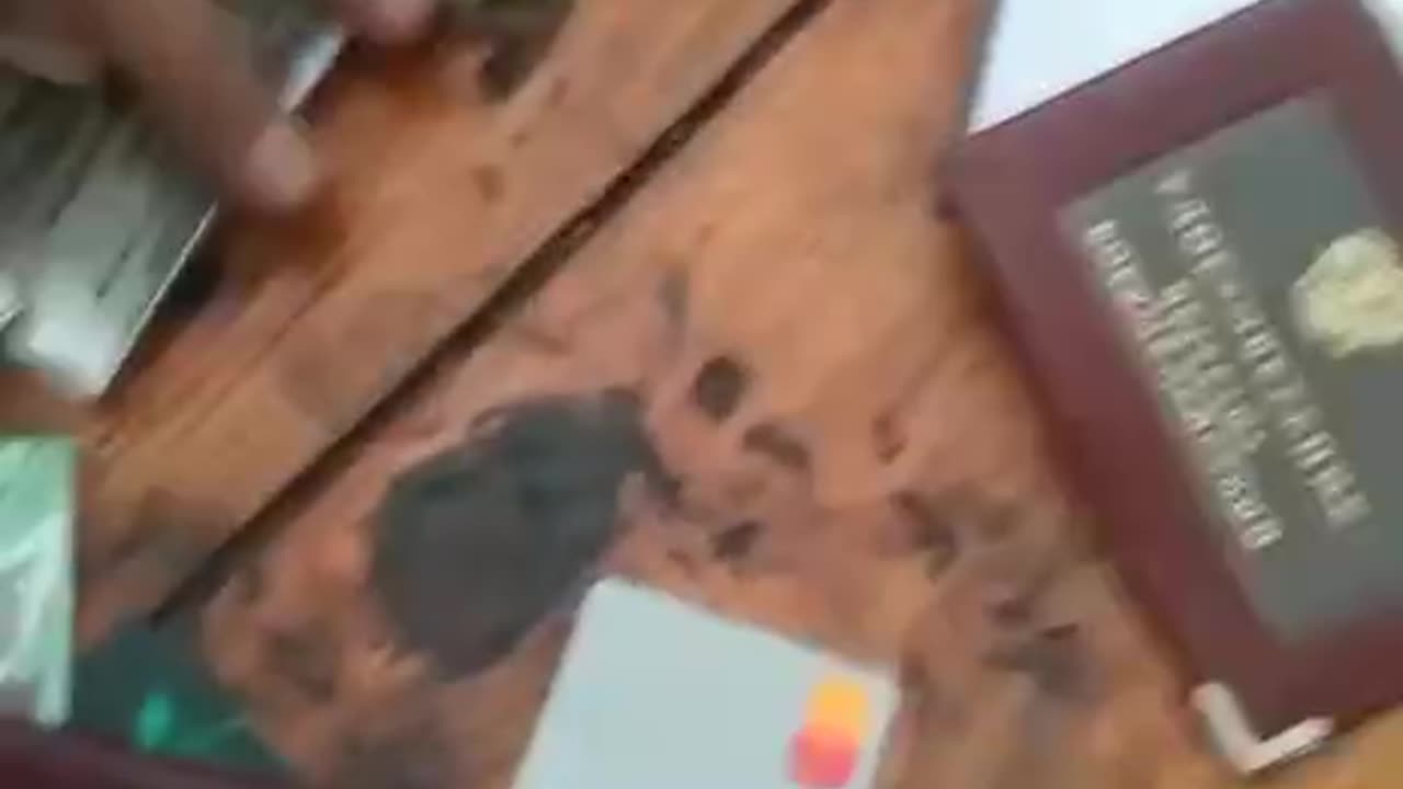Going through Documents Found in an Abandoned Home Russians Had Occupied