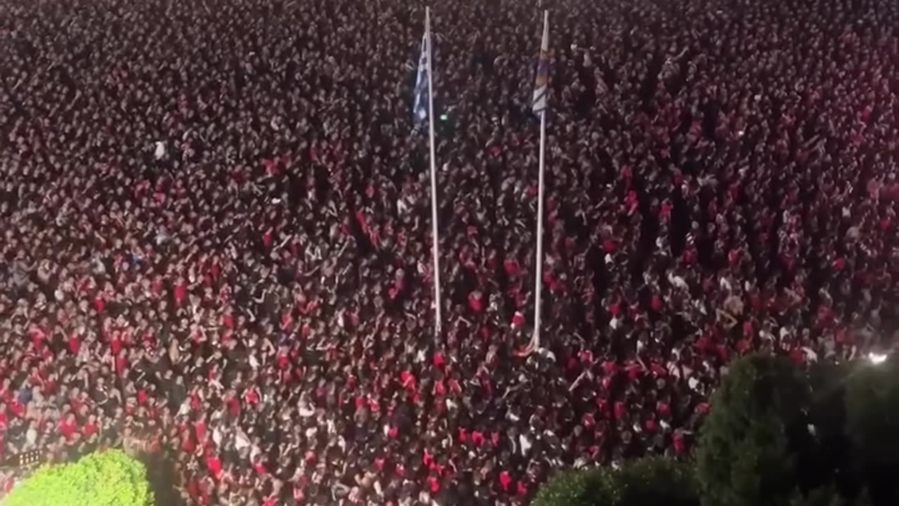 Passionate Olympiacos fans celebrate historic victory.