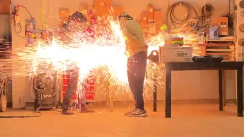 Giant molten metal.explosion in shop