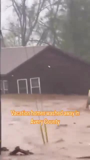 Avery County, North Carolina - Home Floats Away in the river