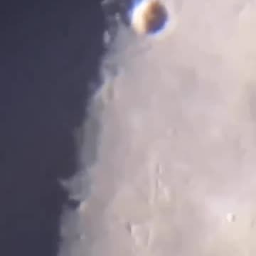Amateur astronomer captures a flashing light on the moon.