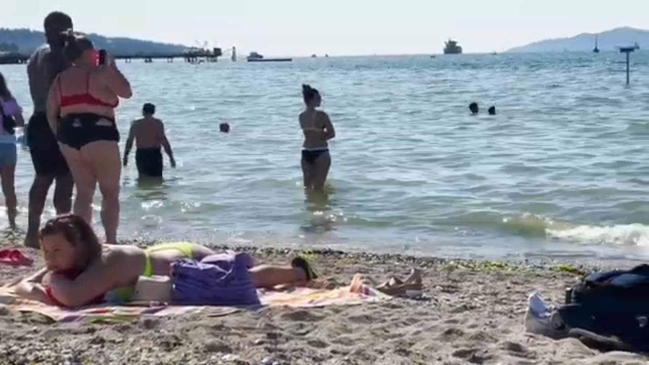 Cool Women on Kitsilano beach. Vancouver, Canada