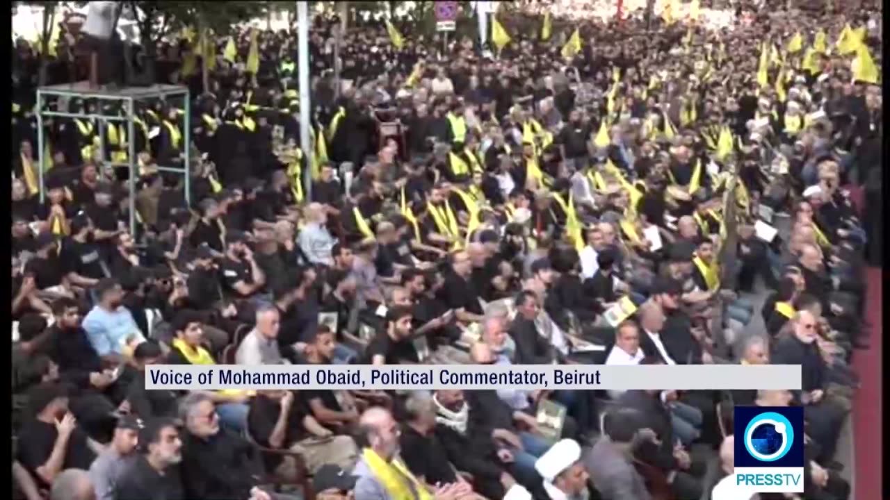 Hezbollah, supporters hold mass funeral for slain commander