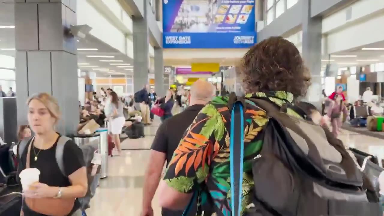 Alex Jones confronts Dr. Francis Collins at the Airport.