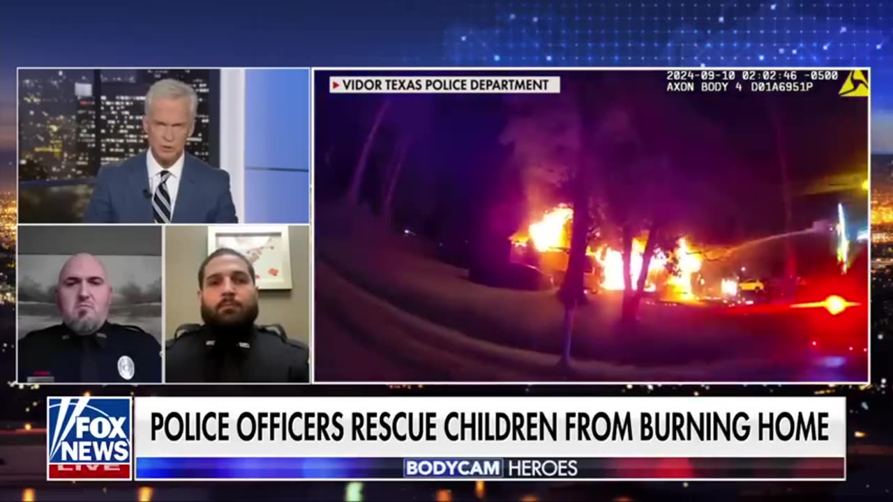 Bodycam footage shows police officers rescue two children from burning home