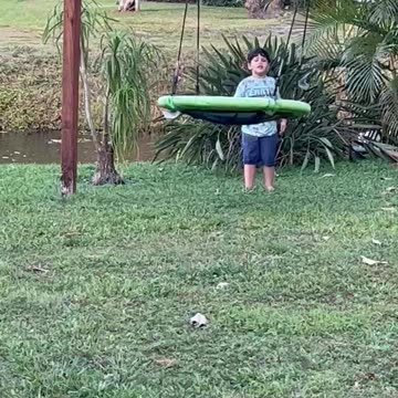 Elijah swings a toy. February 3, 2023