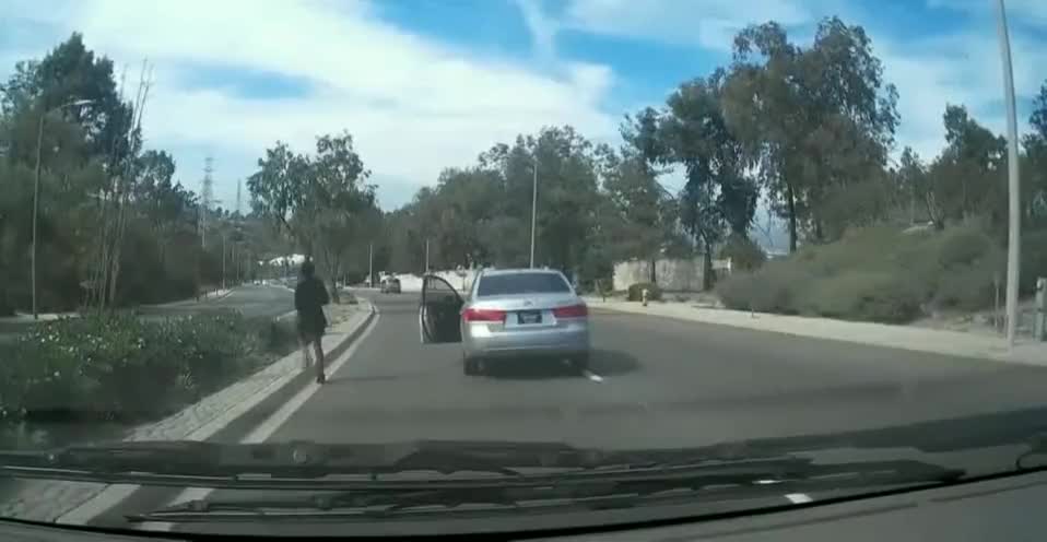 Funny people, girl drops this car like a bad habit...in the middle of the road while driving