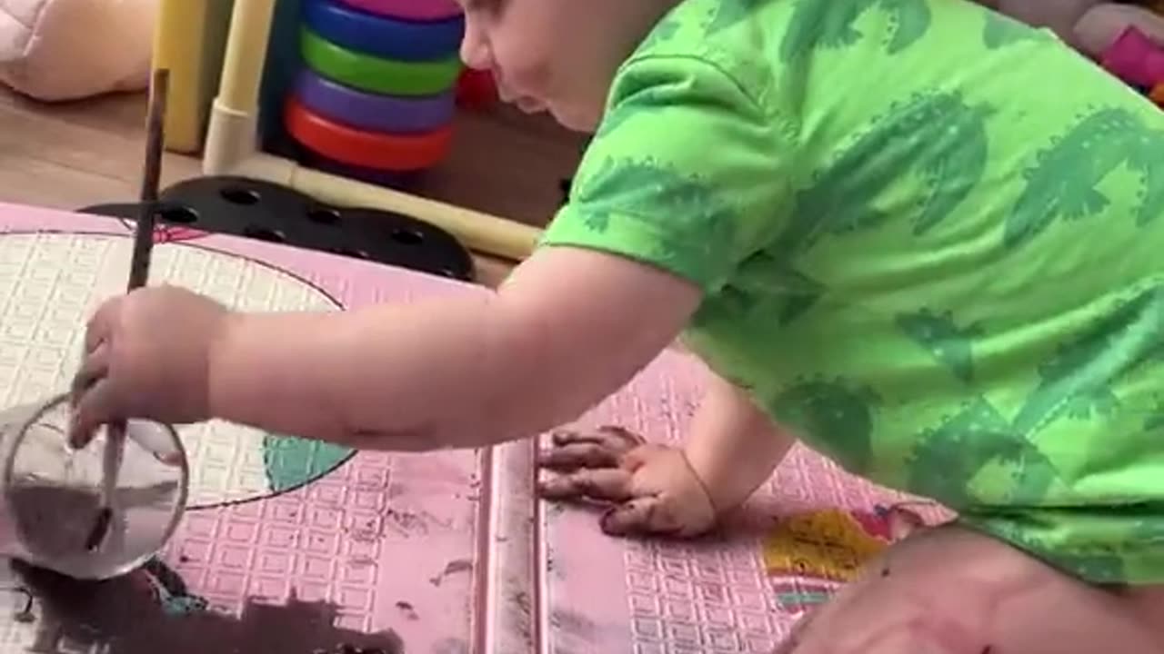 Little Girl Paints With Watercolor