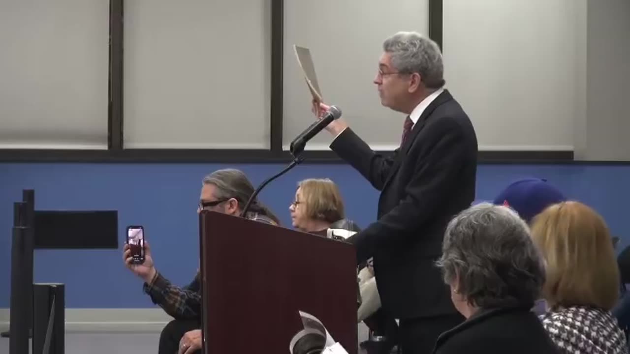 Resident kicked out of town council in Edison, NJ for literally holding up a US Constitution