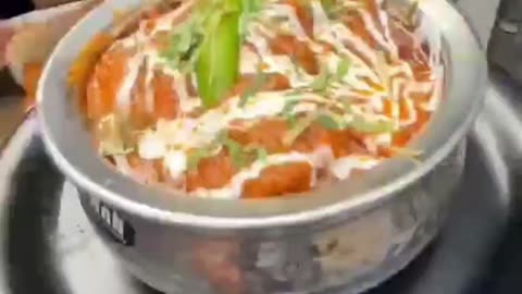Indian food chicken curry making scene