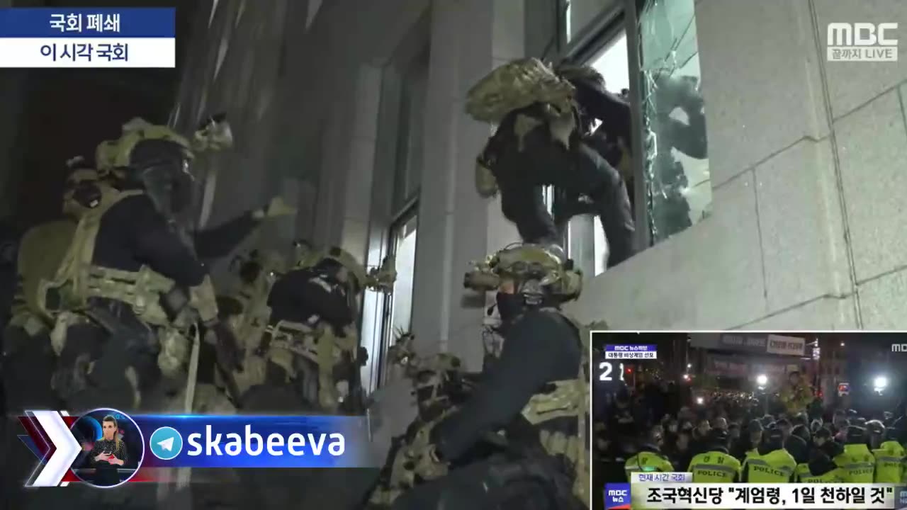 WILD SCENES IN SOUTH KOREA: Military smashing windows to enter Parliament building.