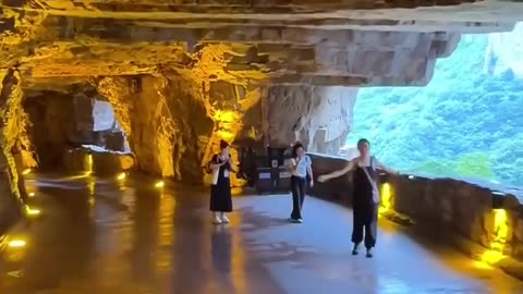 The Guoliang Tunnel Road Is Carved Along The Side Of & Through Taihang Mountains China Connecting The Village Of Guoliang Outside
