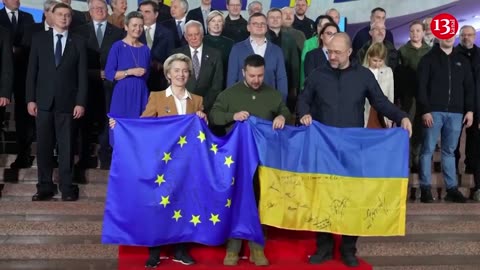 Zelenskiy, von der Leyen exchange signed flags during Kyiv visit