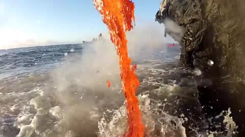 Amazing up close footage of Lava entering the ocean.
