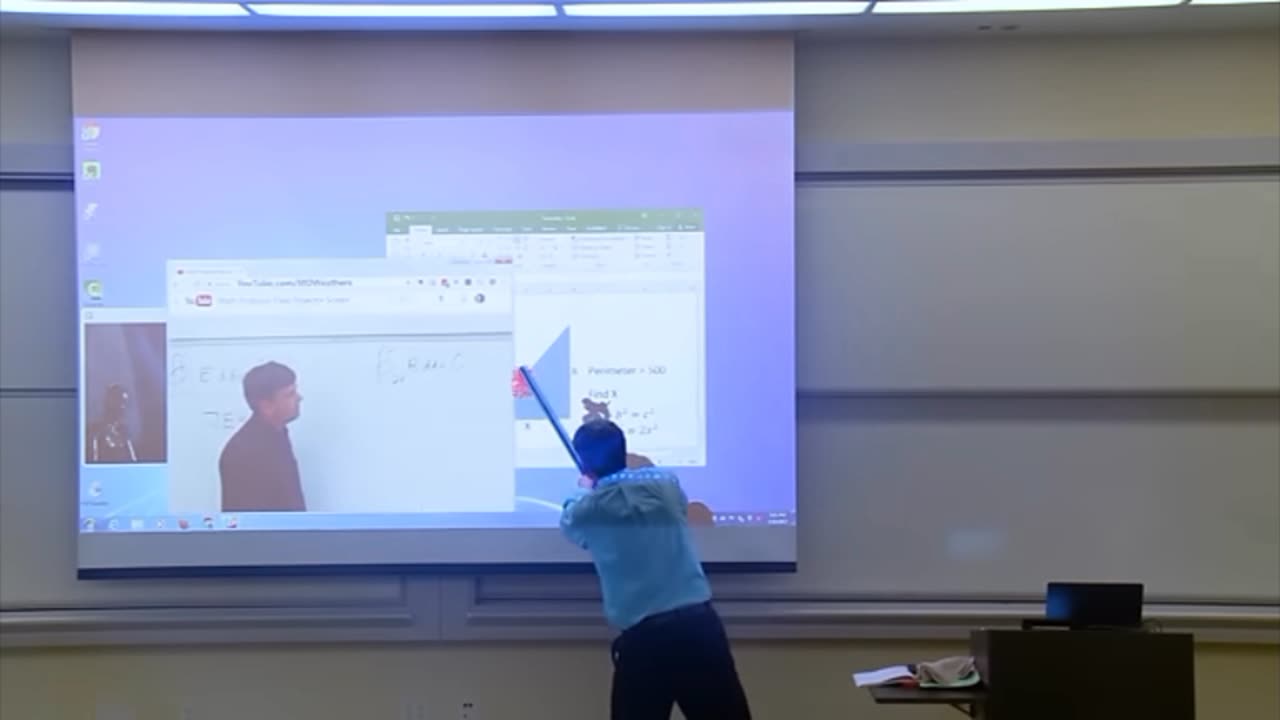 Maths professor cleans the board.