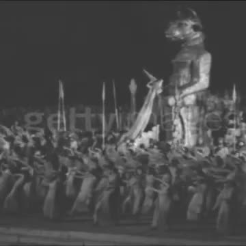 Tiny Hat People Sacrifice Infant (hopefully fake) To Moloch aka Golden Calf