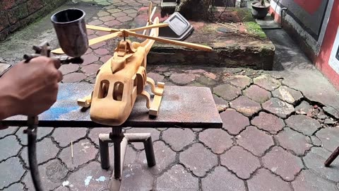 Painting handmade helicopter miniatur