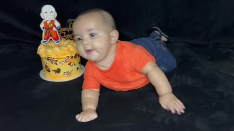 Baby Rolls Headfirst into Birthday Cake