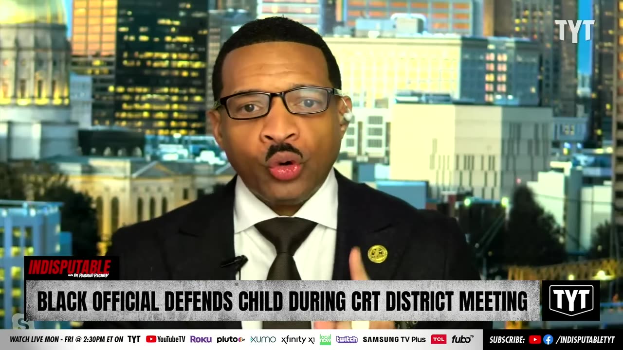 Black Official Steps In Between Man Confronting Child At School Meeting