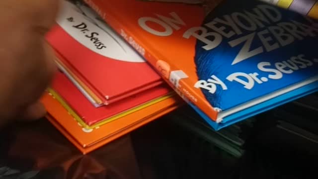 Dr Seuss books in the trash