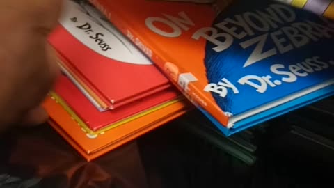 Dr Seuss books in the trash