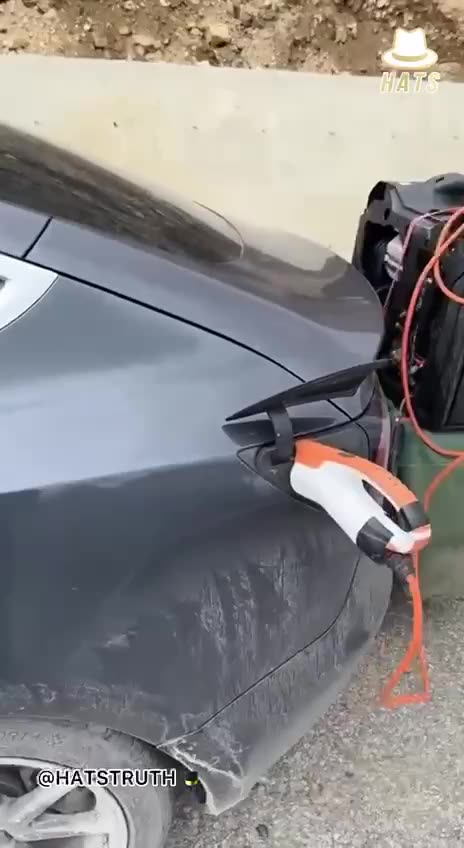 Nothing to see here. Just an electric car being charged by a diesel generator