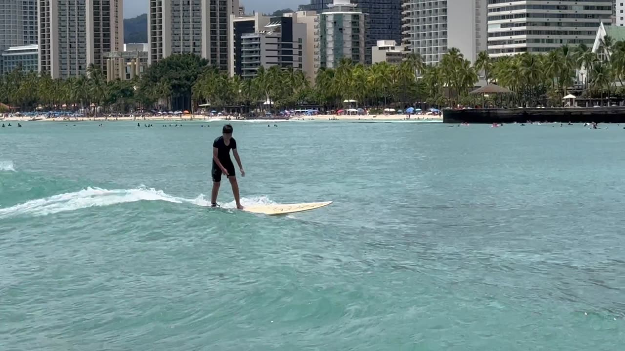 Ethan catching a wave