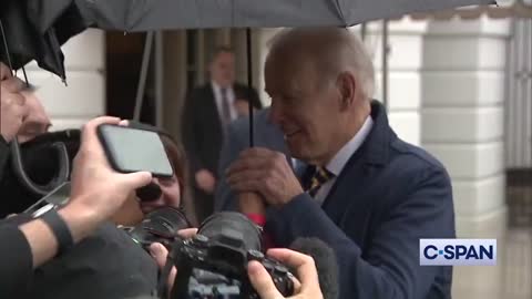 Biden Shocks Reporter By Grabbing Her Hand In Strange Moment