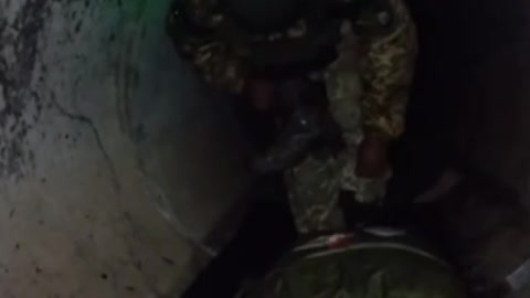 Several Ukrainian Soldiers hiding in a sewer to escape constant Russian shelling