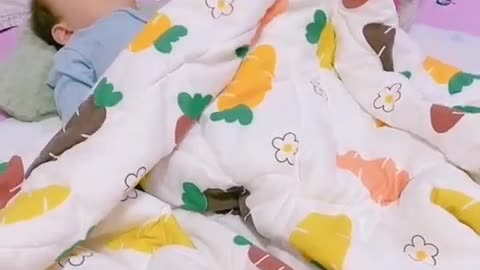 Cute dog falls in love with little sleepy baby