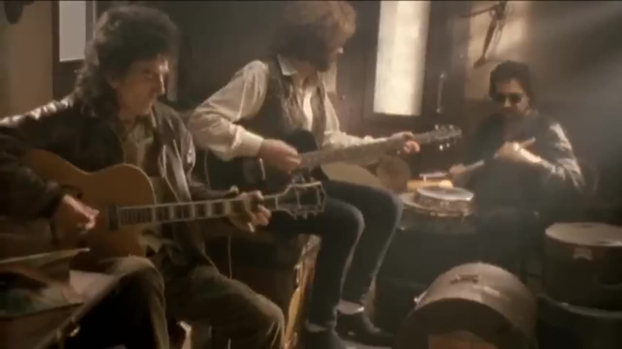 The Traveling Wilburys - End Of The Line (Official Video)