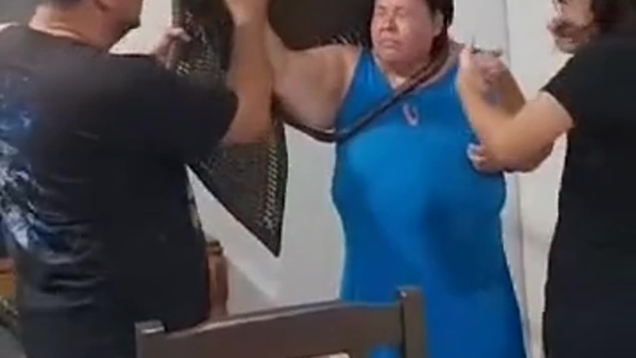 Woman Gets Stuck in Chair