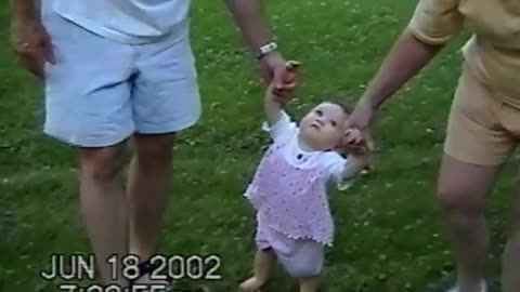 June 18, 2002 - A Toddler Out for a Summer Stroll