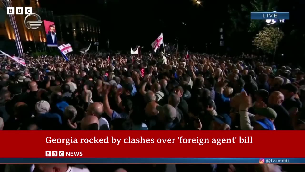 Georgia: Protesters hit by police watercannons after passing of 'Russian inspired' bill BBC News