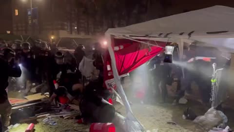 Police attacking peaceful protesters at @UCLA