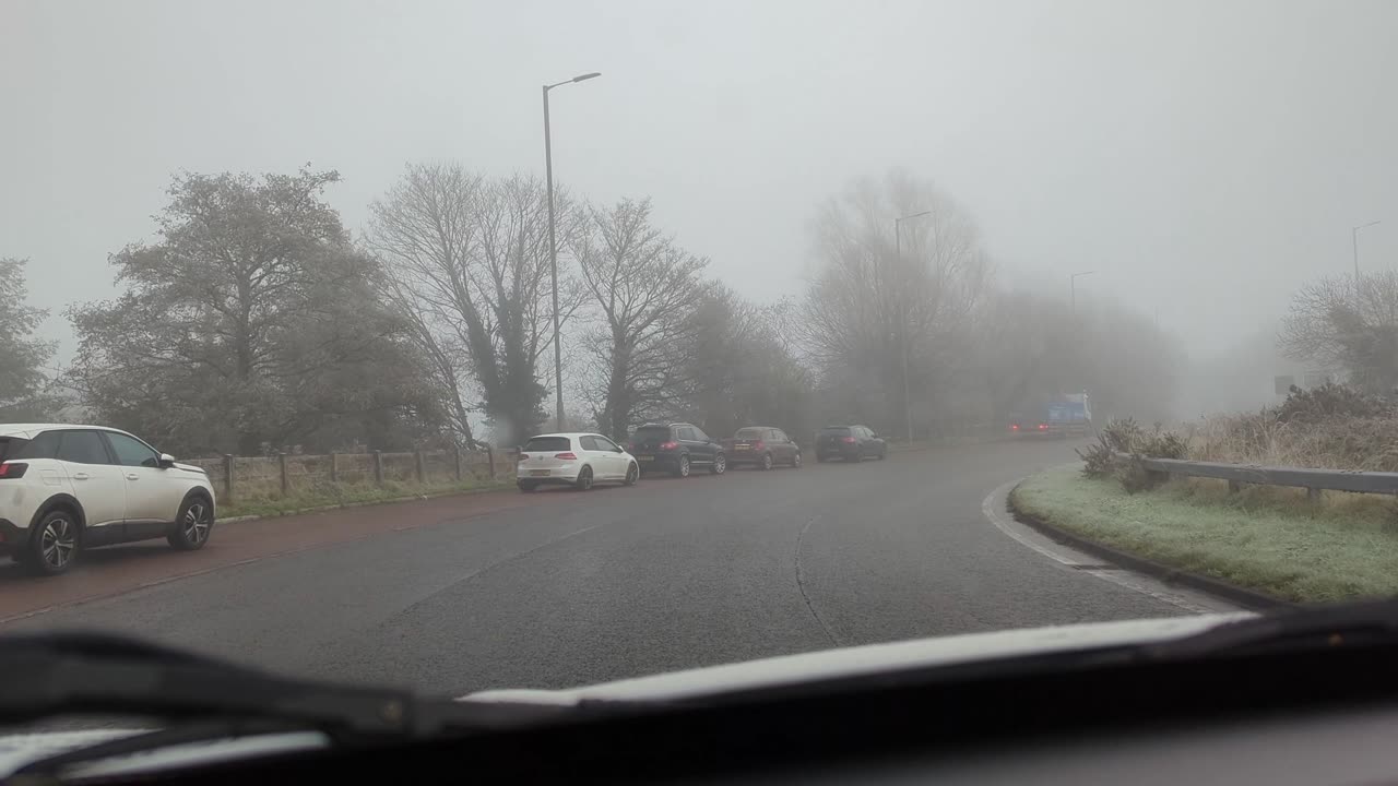 Driving on a foggy, cold day