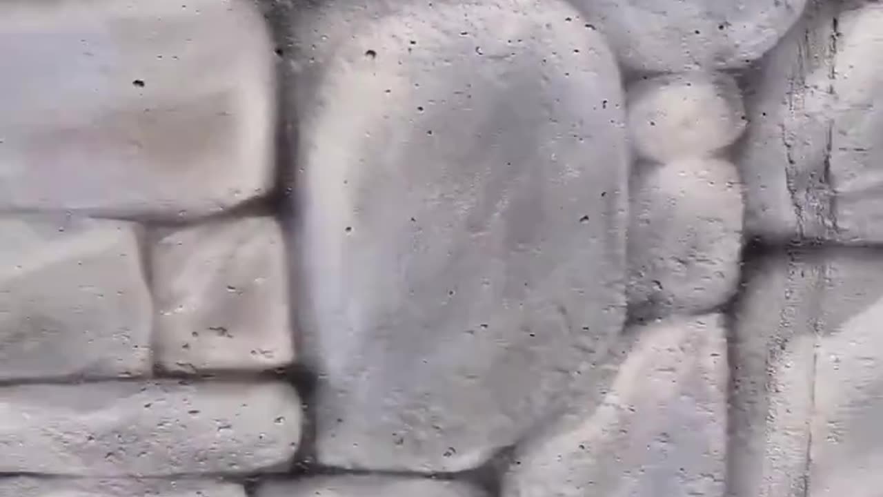 Spray Painting A Brick Wall