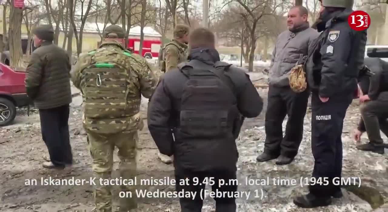 People wounded in Kramatorsk strikes groan in pain as they receive treatment on snowy ground