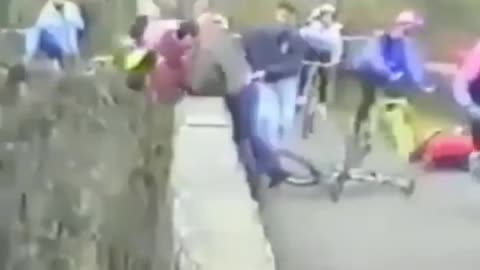 Fan & Cyclist Goes Overboard