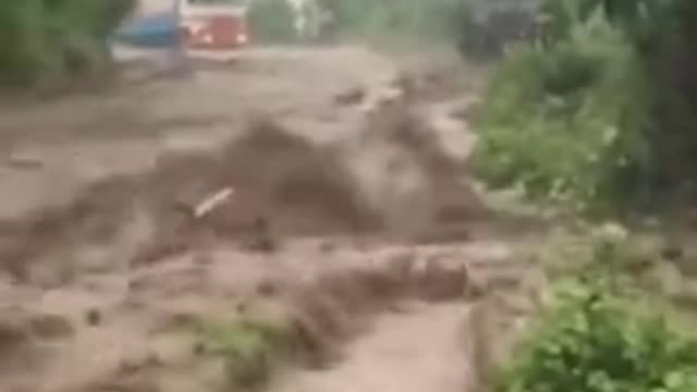 People Are Crazy - Dad Drives Kid On Motorcycle In Flood