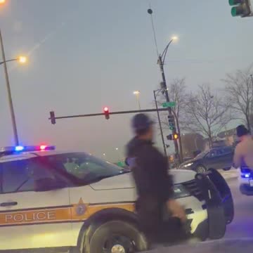 Chicago: Illinois State Trooper caught on video falls off fleeing suspects car hood.