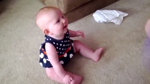 baby playing and laughing