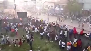 Video shows scores climbing Guinea stadium walls to escape crush