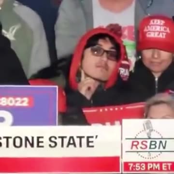 Trump Pennsylvania Rally - Man makes symbol to slash throat